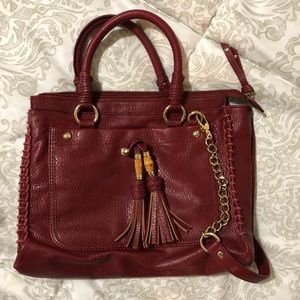 Red purse with crossbody strap
